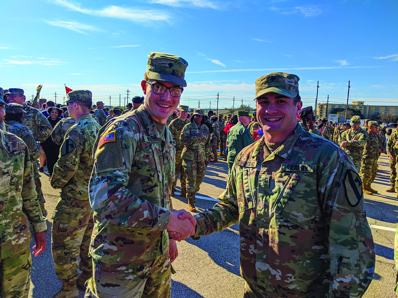 SPC David Willey congratulates SPC Mark Halstead on a job well done upon the completion of SPC Halstead’s Basic Leader Course graduation ceremony. SPC Halstead exceeded the standard and successfully graduated on the Commandant’s list. 